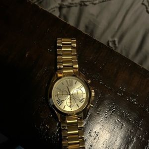 Micheal Kors gold watch ( ladies )